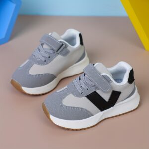 une paire de chaussures de sport unisexes pour garçons et filles, baskets d'extérieur décontractées et polyvalentes pour enfants au printemps et en automne.