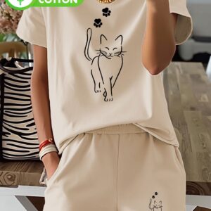 ensemble de détente pour femmes, imprimé pur, décontracté, col rond, manches courtes, short à poches avec un dessin linéaire et des empreintes de pattes